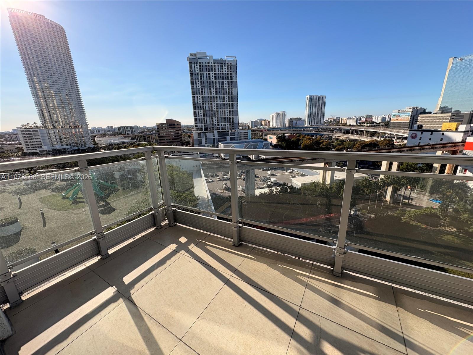 90 Southwest 3rd Street, Unit 1205 Miami, FL 33130 - Photo 15 of 41 a view of swimming pool with outdoor seating and city view