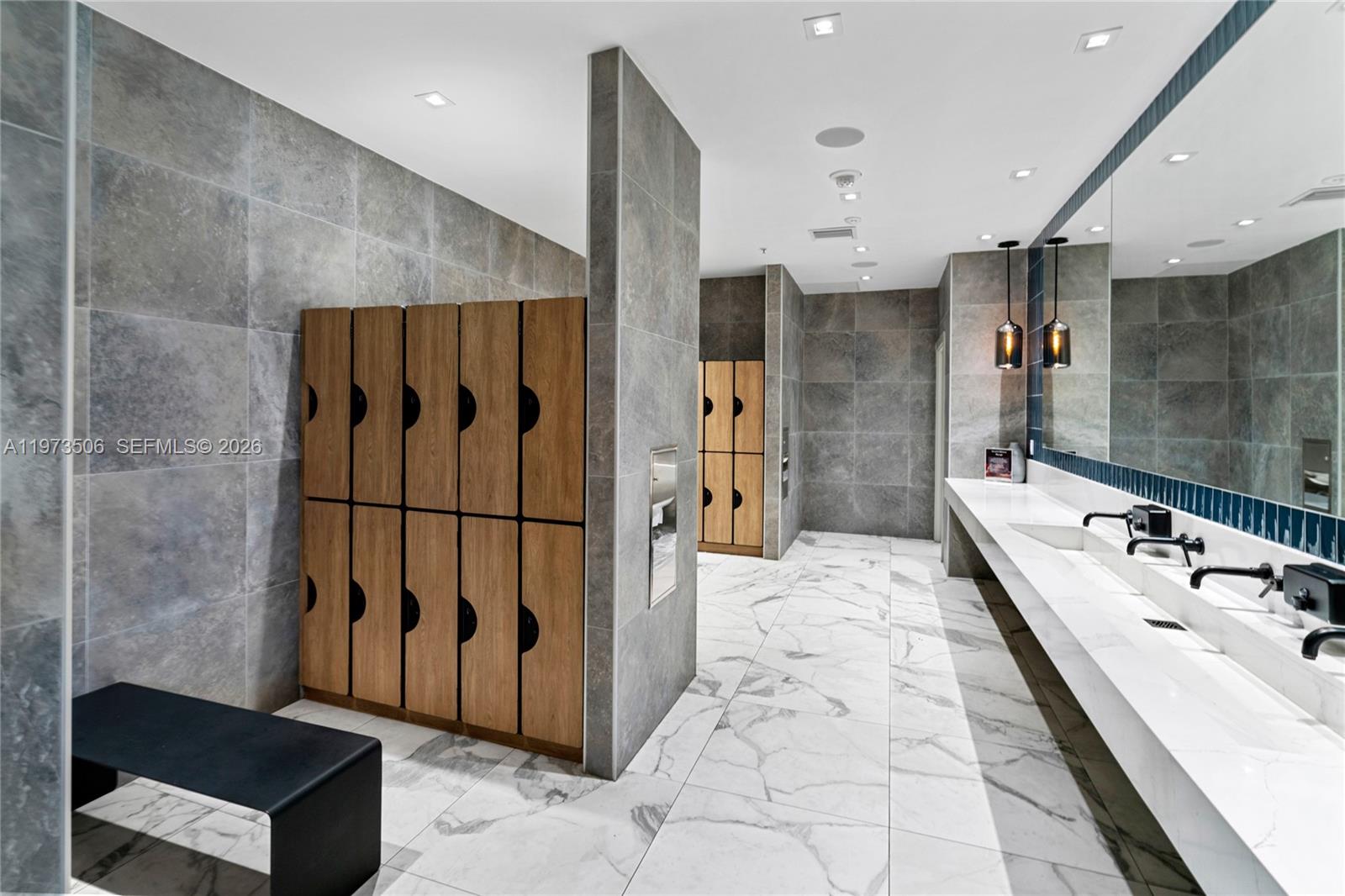 90 Southwest 3rd Street, Unit 1205 Miami, FL 33130 - Photo 25 of 41 a bathroom with a bathtub and a shower