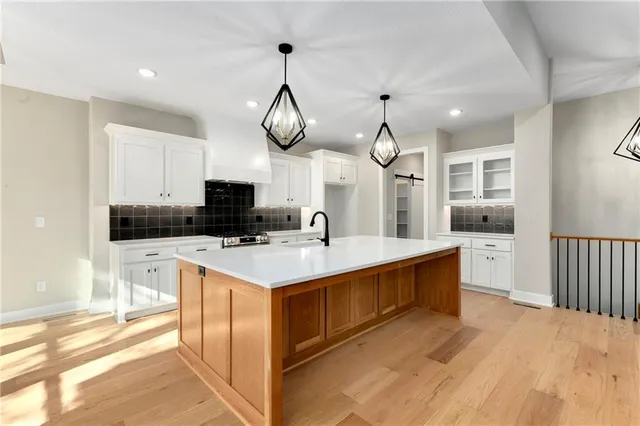 $709,900 | 3940 Southwest Flintrock Drive, Lee's Summit, MO 64082