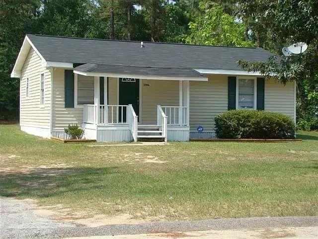 2235 A Moncrieff Street Augusta, GA 30906 - Photo 2 of 10 a front view of a house with garden