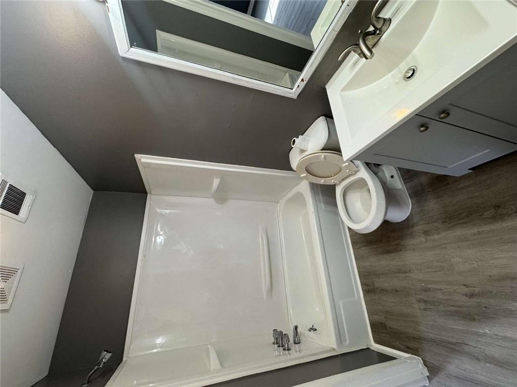 2235 A Moncrieff Street Augusta, GA 30906 - Photo 7 of 10 a bathroom with a sink and a mirror