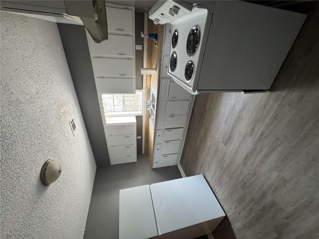 2235 A Moncrieff Street Augusta, GA 30906 - Photo 9 of 10 a kitchen with a stove a sink and a refrigerator