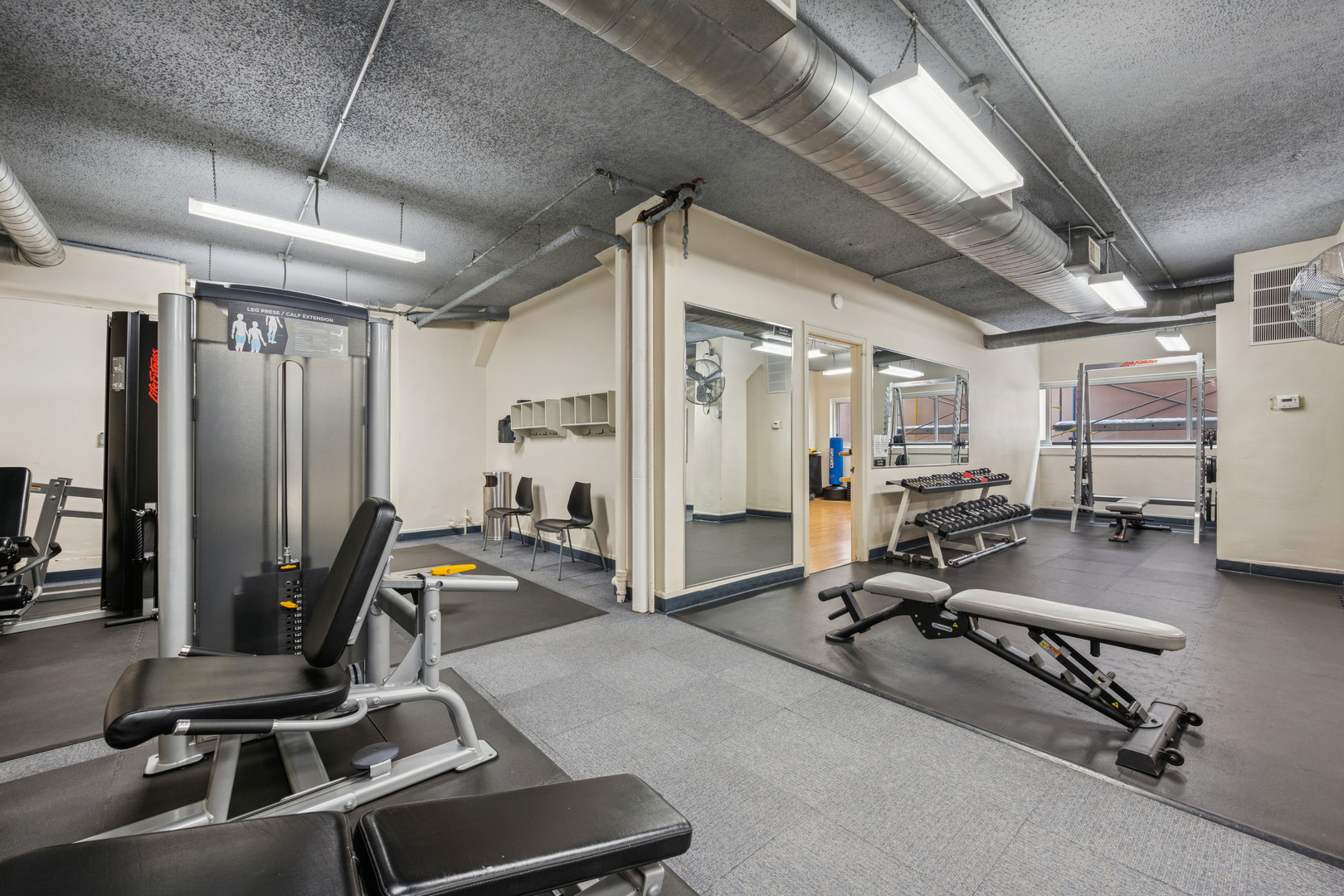 5555 North Sheridan Road, Unit 602 Chicago, IL 60640 - Photo 18 of 20 a view of a room with gym equipment