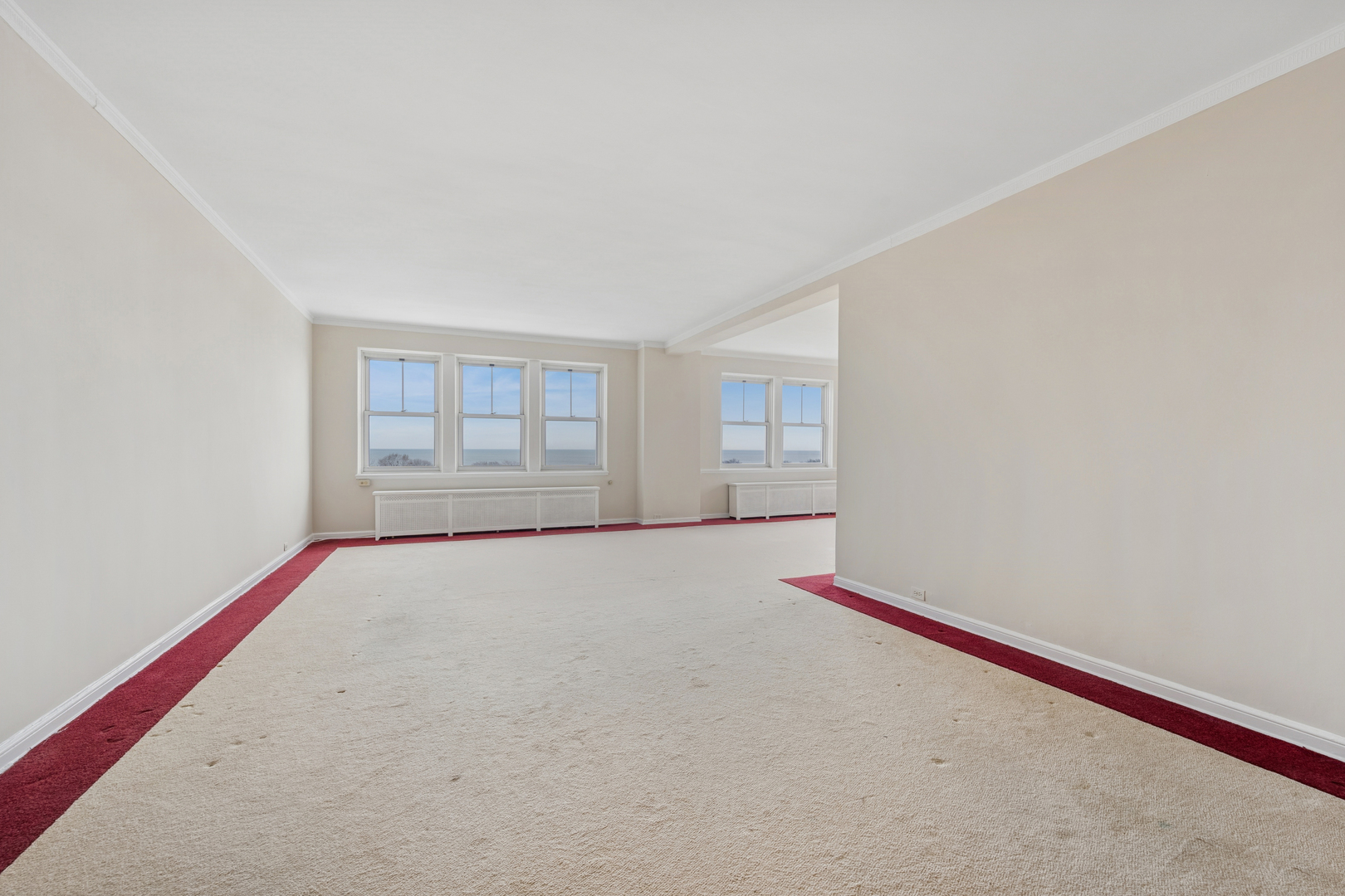5555 North Sheridan Road, Unit 602 Chicago, IL 60640 - Photo 4 of 20 a view of an empty room with a window
