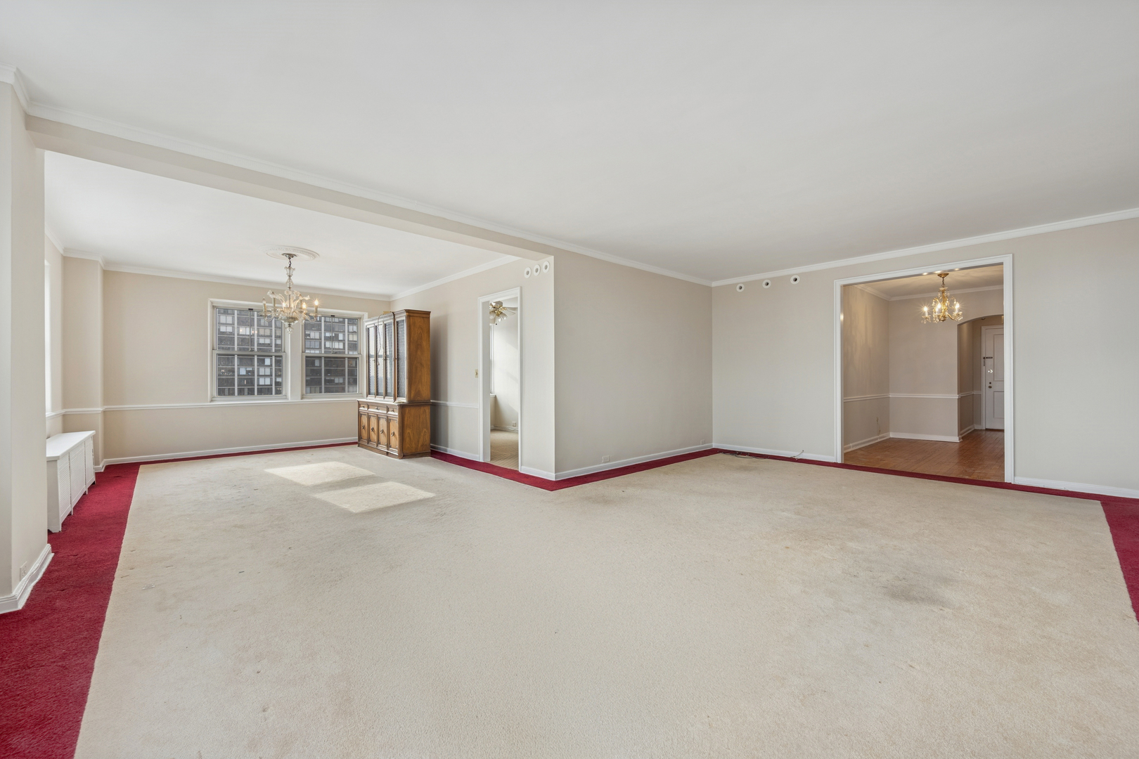 5555 North Sheridan Road, Unit 602 Chicago, IL 60640 - Photo 5 of 20 a view of an empty room with a window