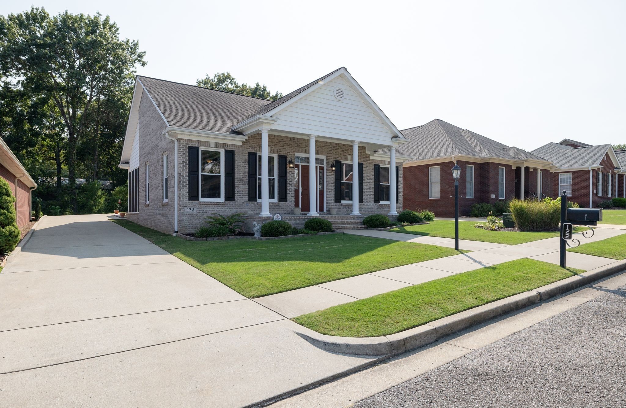 122 Riley Circle Fayetteville, TN 37334 - Photo 2 of 31 a front view of a house with a yard and garage