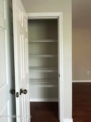 a view of a bathroom with a door