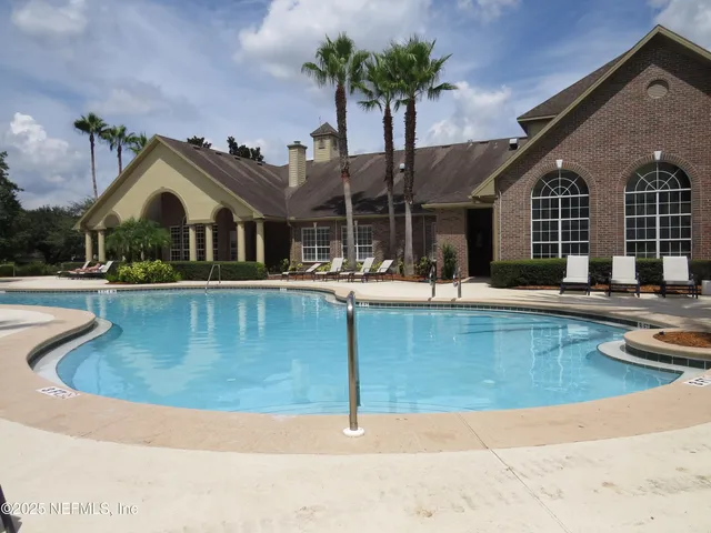 a swimming pool view with a outdoor space