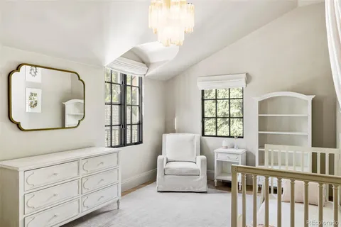 a bathroom with a sink vanity and mirror