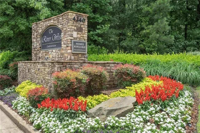 a view of a couches with a tree