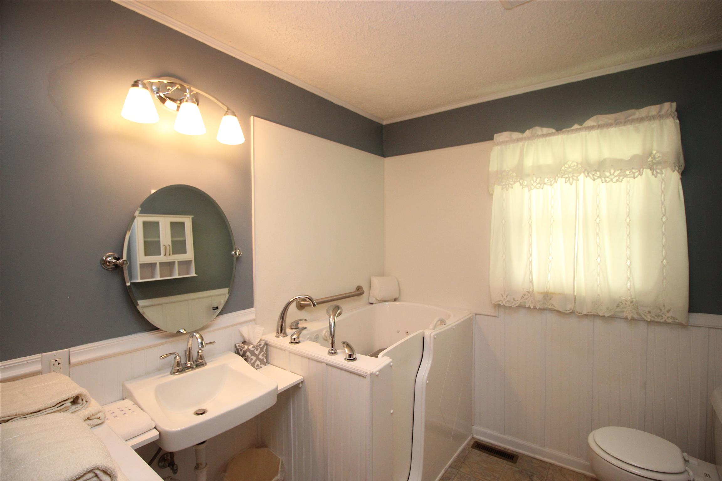 130 Robert Porter Road Dickson, TN 37055 - Photo 14 of 16 Hall bath has walk in tub