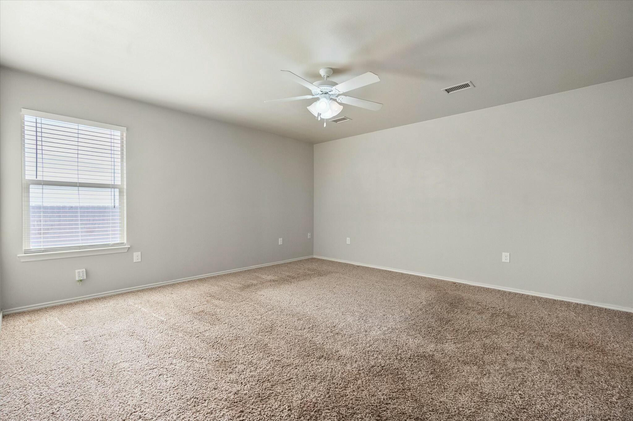 2619 113th Street Lubbock, TX 79423 - Photo 23 of 31 a view of an empty room with a window