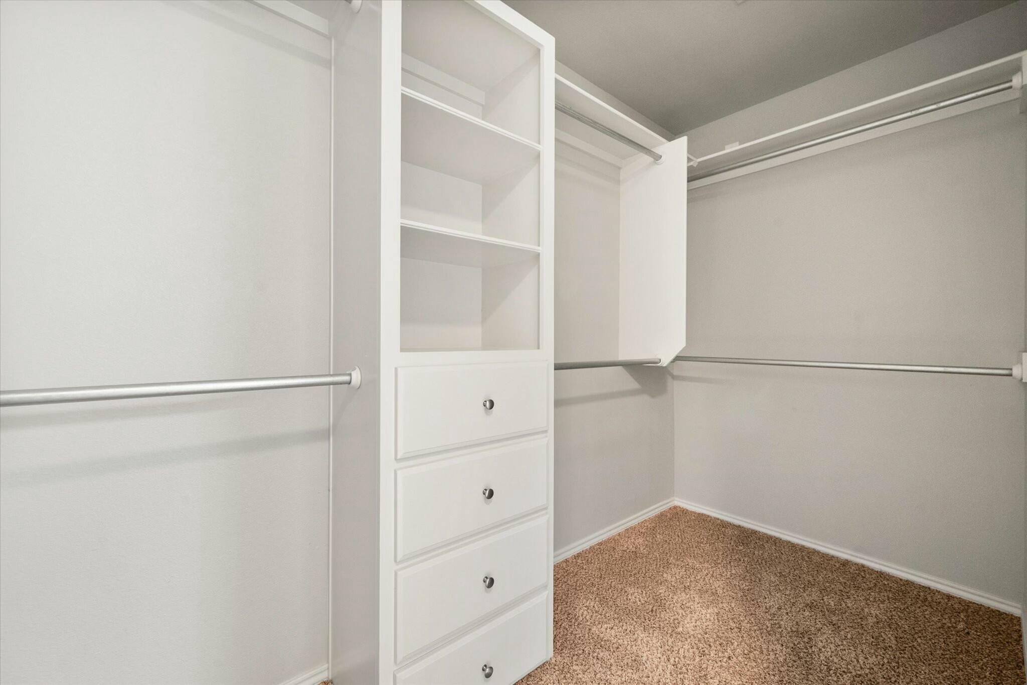 2619 113th Street Lubbock, TX 79423 - Photo 28 of 31 a view of an empty walk in closet
