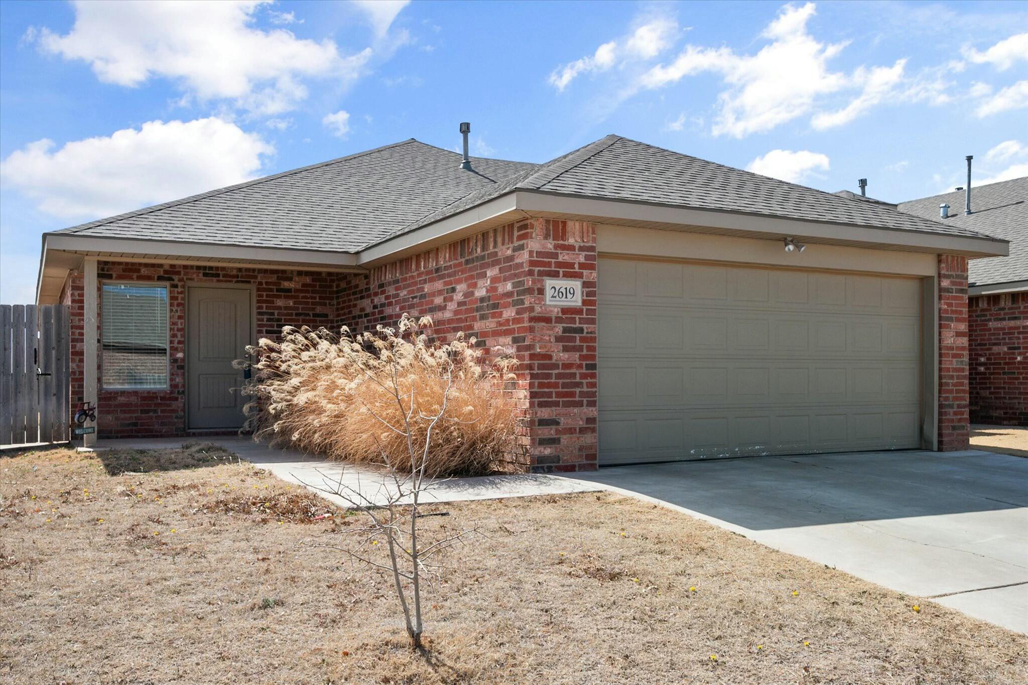 2619 113th Street Lubbock, TX 79423 - Photo 3 of 31 a view of a house with backyard