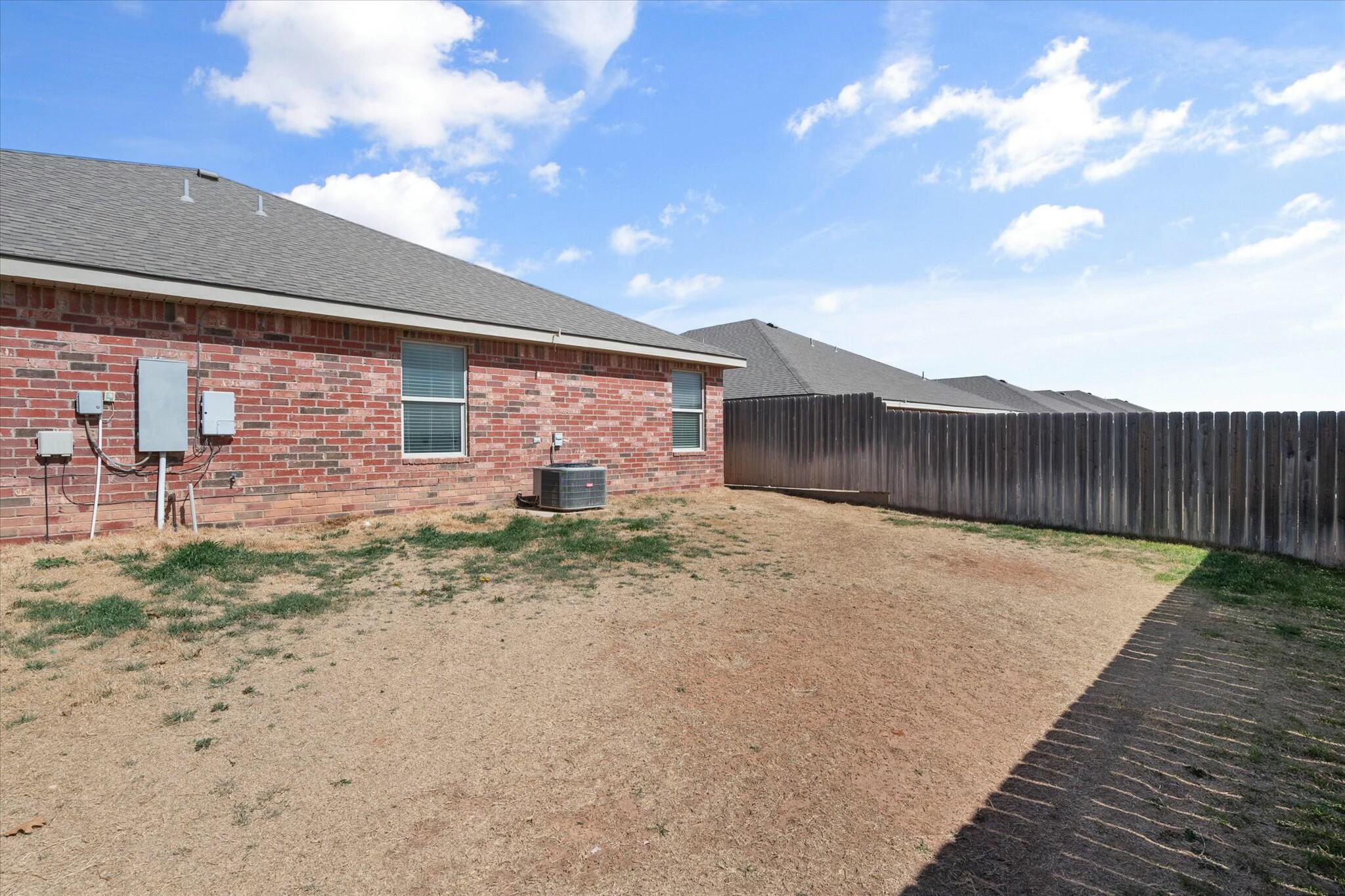 2619 113th Street Lubbock, TX 79423 - Photo 31 of 31 a view of a backyard