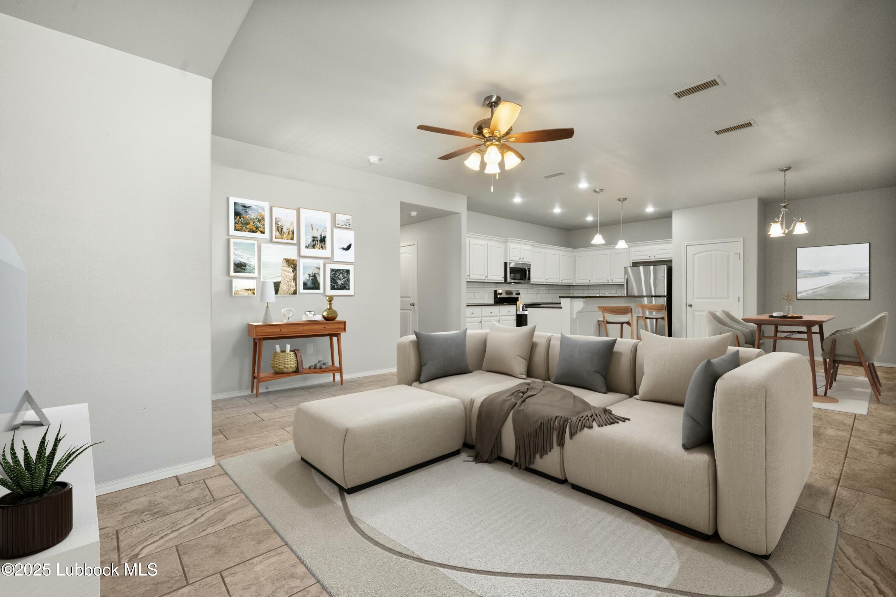 2619 113th Street Lubbock, TX 79423 - Photo 5 of 31 a living room with furniture and a chandelier