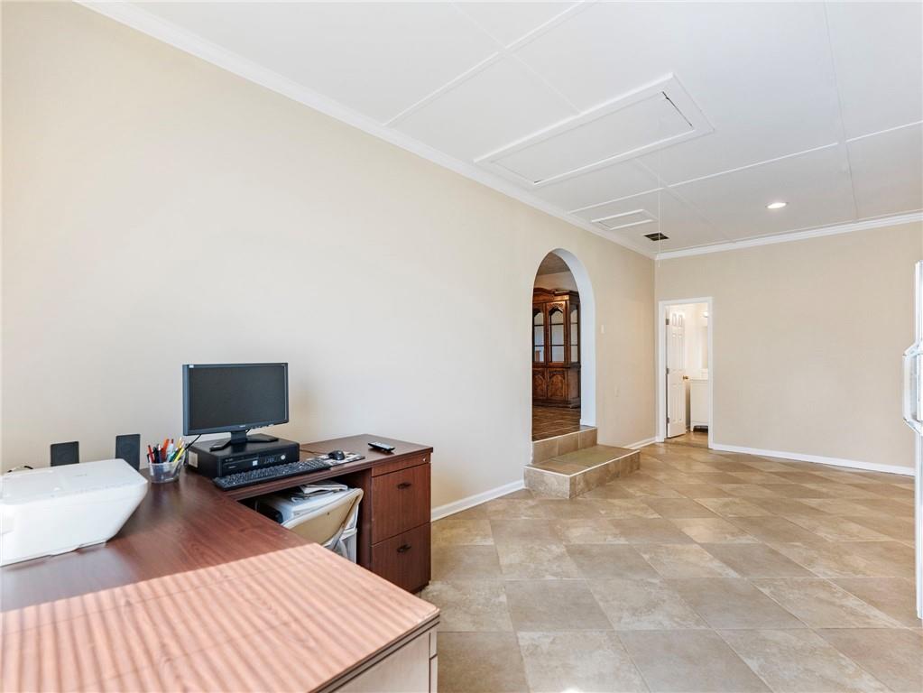 1686 Shoal Creek Road Monroe, GA 30656 - Photo 23 of 50 a view of a workspace with furniture and a window