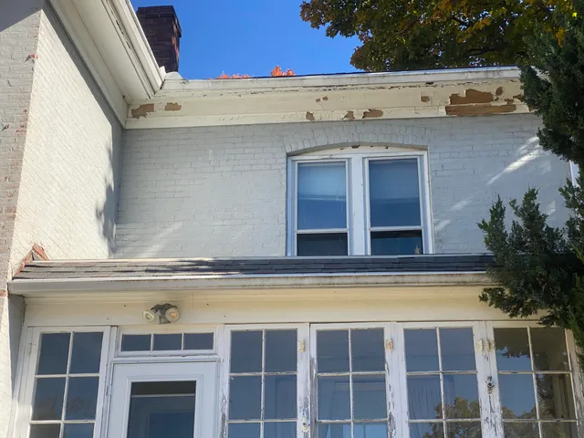 a view of a back yard of the house