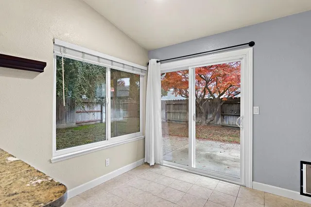 a view of a room with a large window