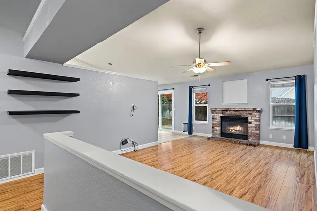 a view of kitchen with furniture and fireplace