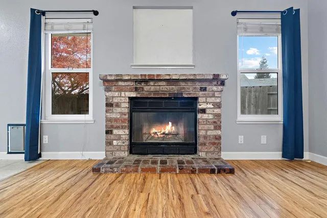 a living room with a fireplace