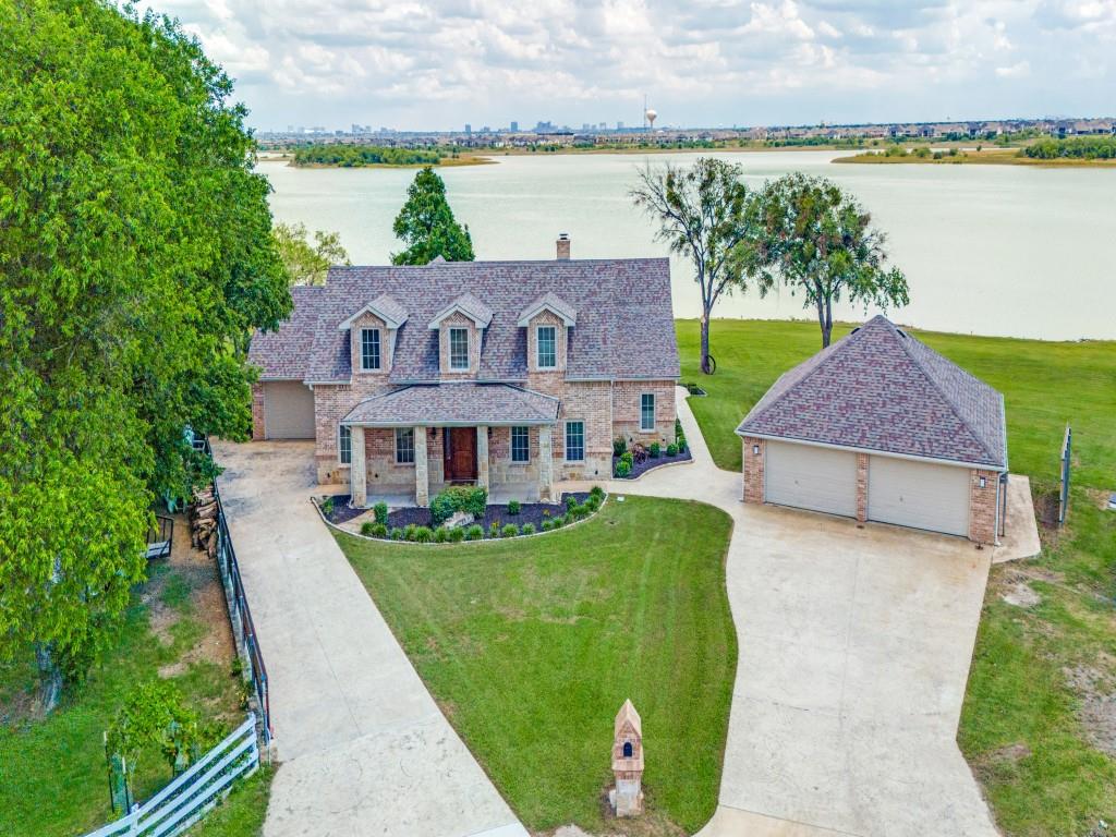 5975 Diamond Spur Frisco, TX 75036 - Photo 1 of 40 a view of a house with a yard and a fountain