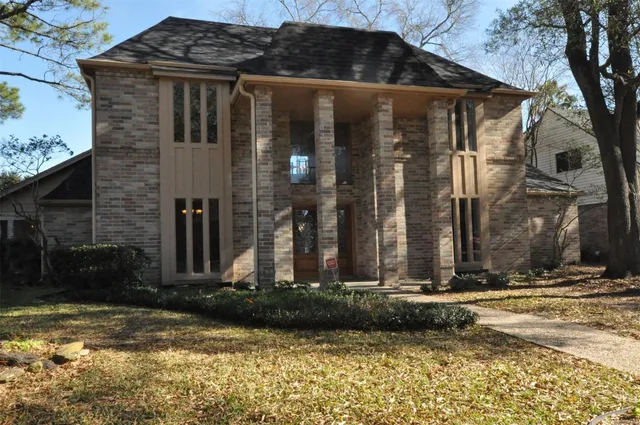 a front view of house with a yard