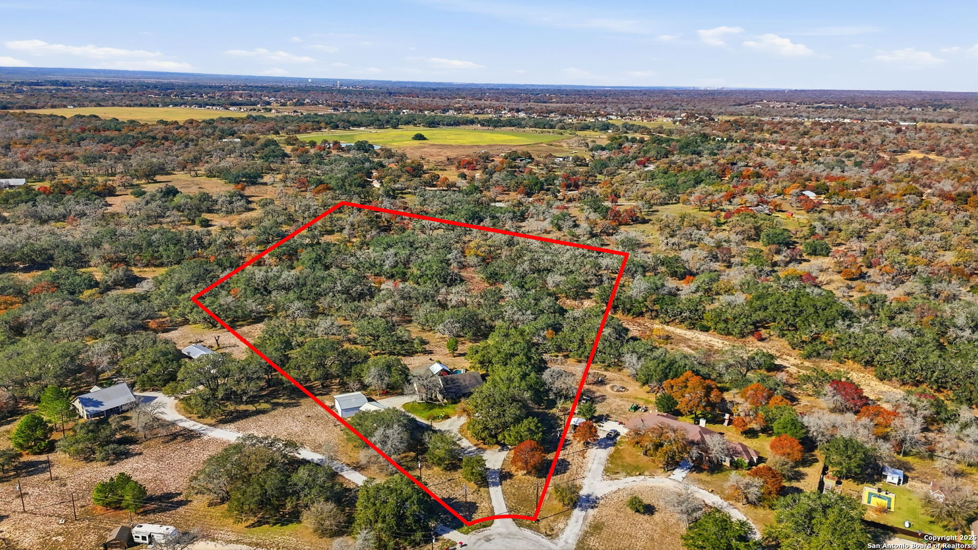 805 Paddy Road Floresville, TX 78114 - Photo 26 of 26 an aerial view of residential houses with outdoor space
