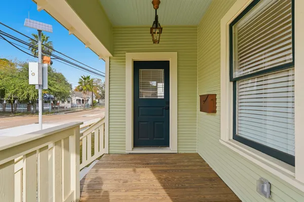 a front view of a house with a porch