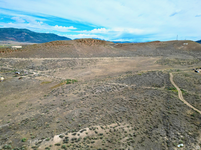 600 East E Street Moroni, UT 84646 - Photo 6 of 38 Expansive undeveloped land featuring natural desert vegetation, rolling hills, and distant mountain ranges