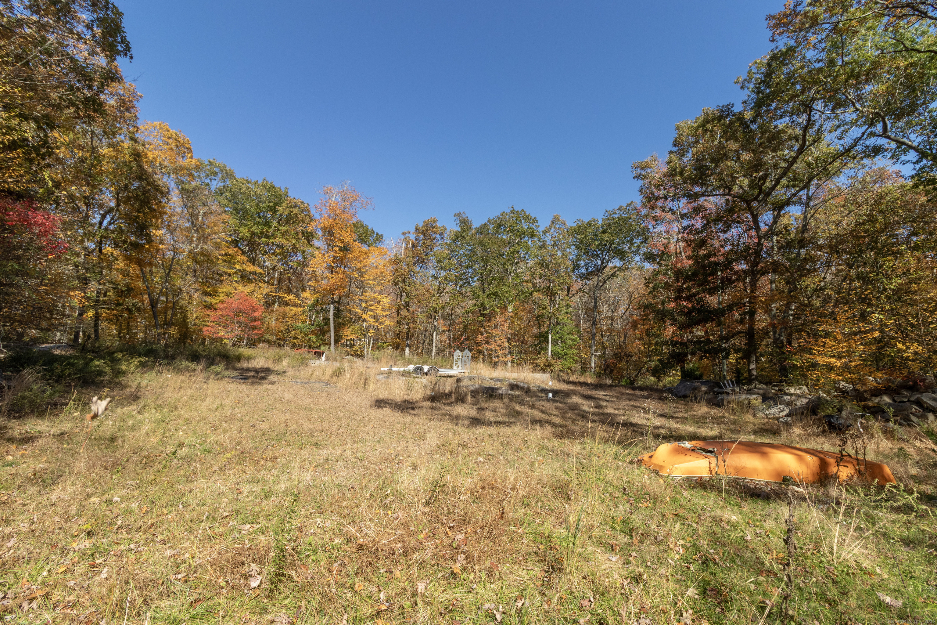 4 Laurel Lane Clinton, CT 06413 - Photo 23 of 30 a view of a yard with trees in the background