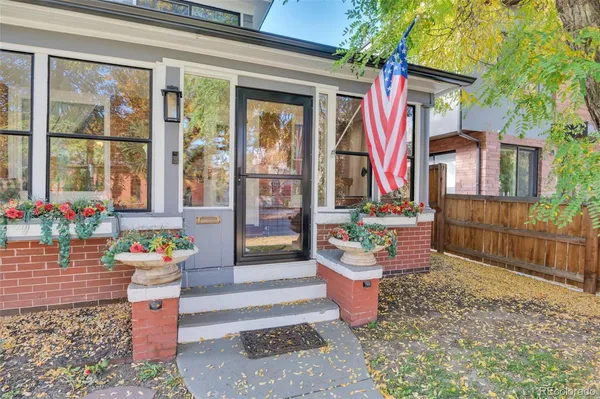 a floor to ceiling window with outdoor seating