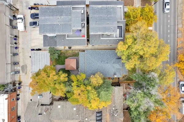 aerial view of a house with a yard