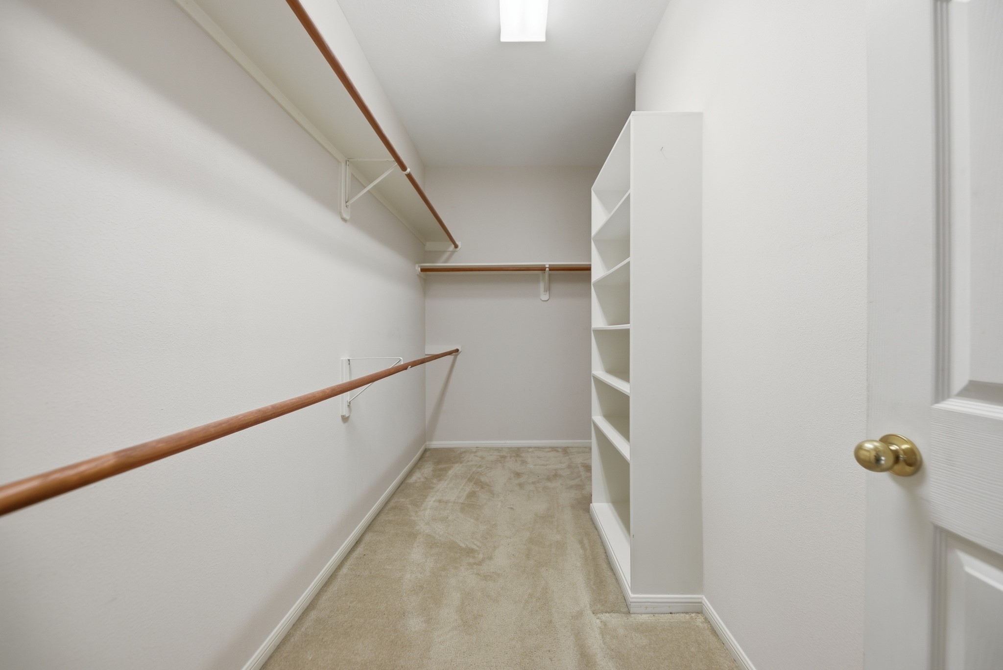 1409 Ward Bend Road Sealy, TX 77474 - Photo 22 of 39 Spacious primary closet, separate from the primary bathroom.