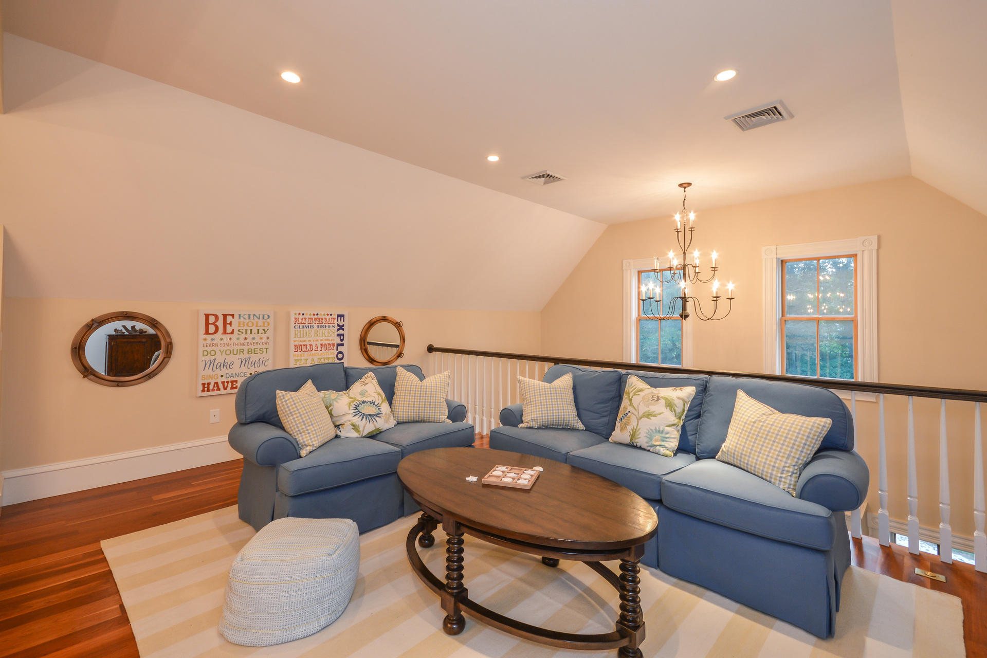 169 Tonset Road Orleans, MA 02653 - Photo 19 of 35 a living room with furniture and a rug