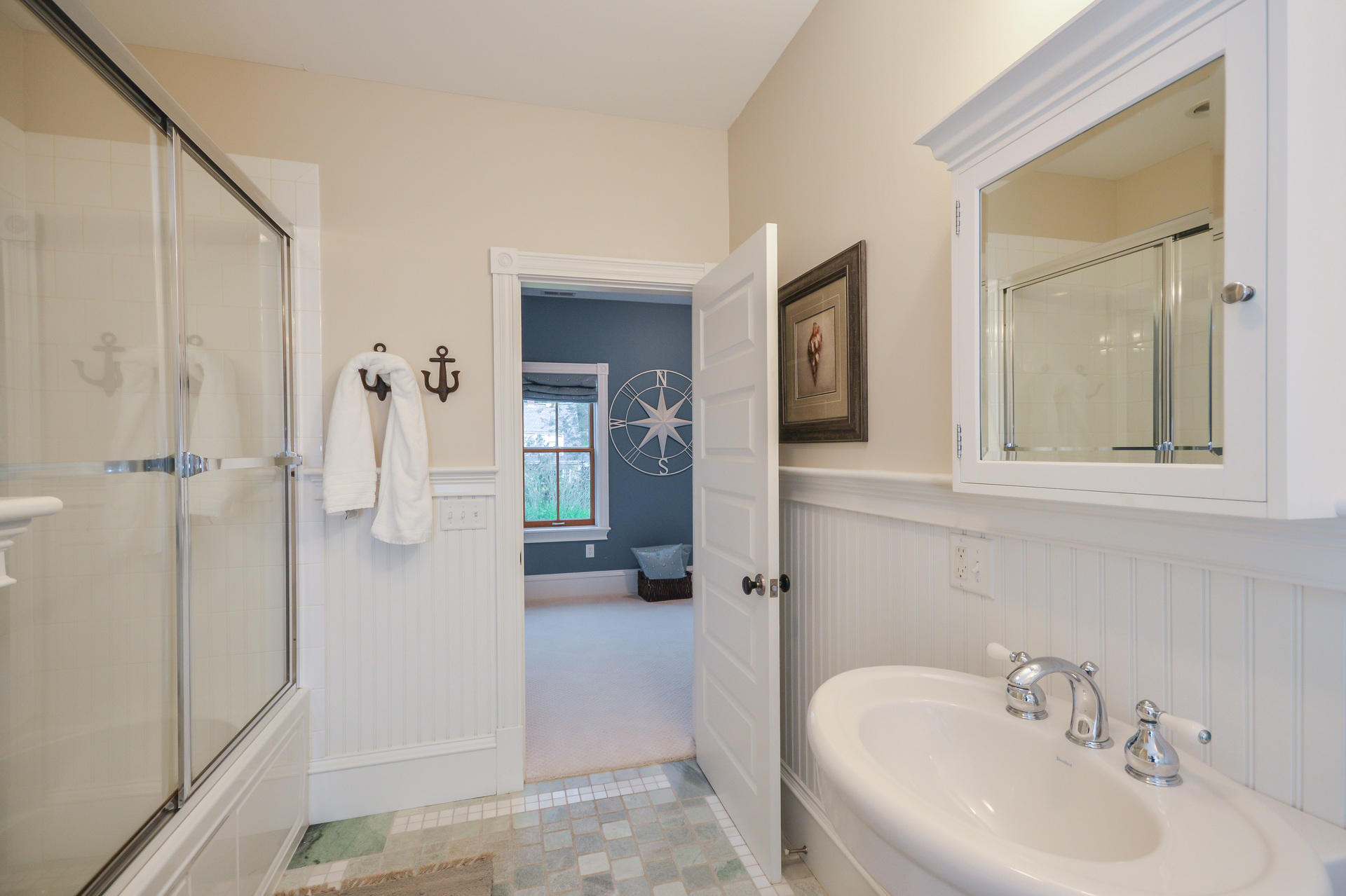 169 Tonset Road Orleans, MA 02653 - Photo 21 of 35 a bathroom with a sink and shower