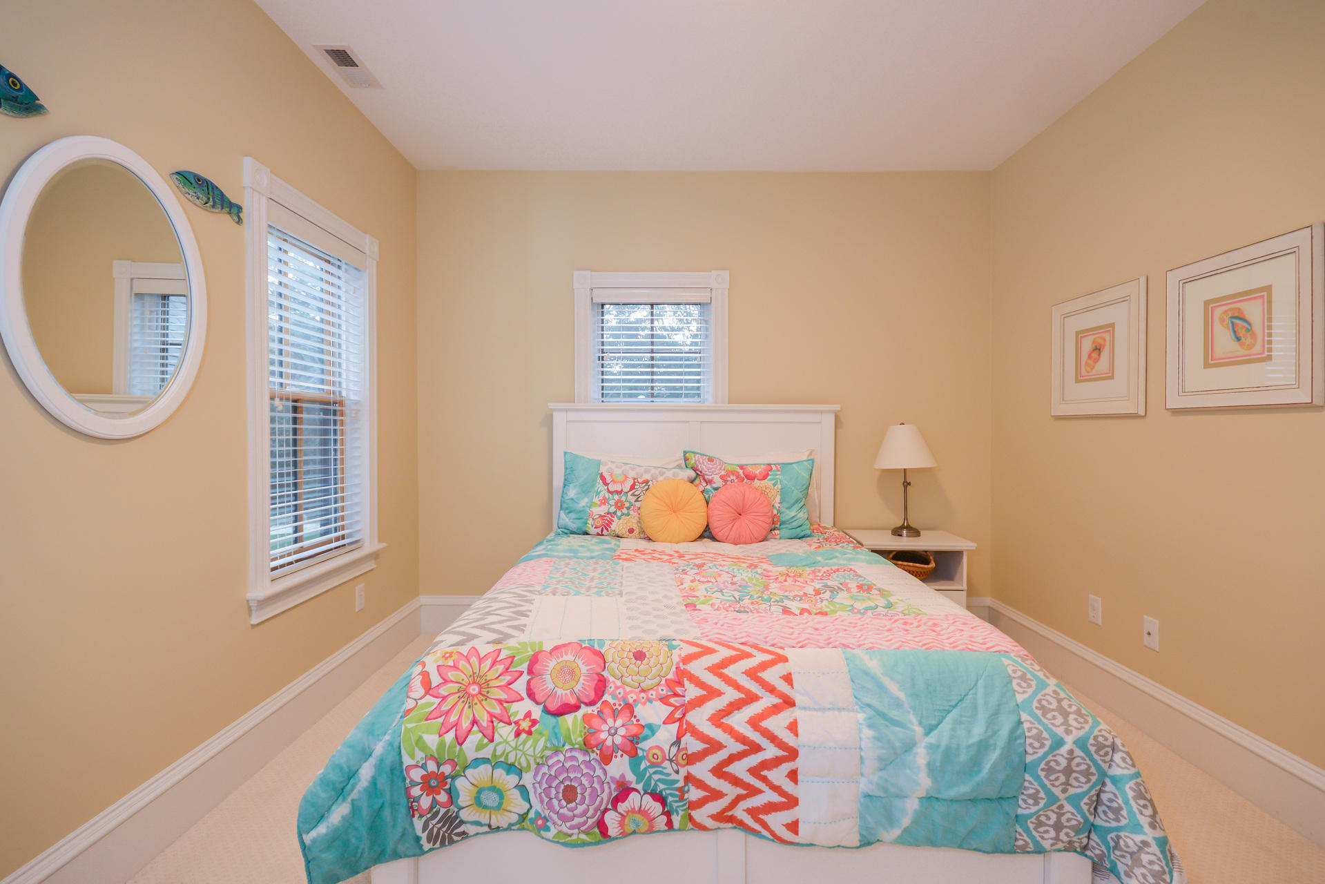 169 Tonset Road Orleans, MA 02653 - Photo 24 of 35 a bedroom with a bed and a window