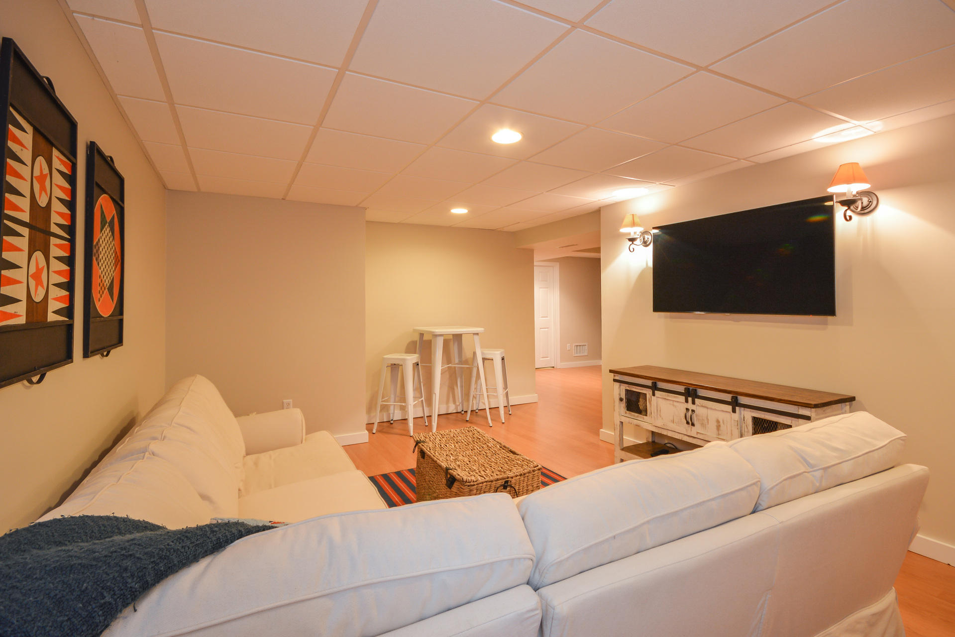 169 Tonset Road Orleans, MA 02653 - Photo 26 of 35 a living room with furniture and a flat screen tv