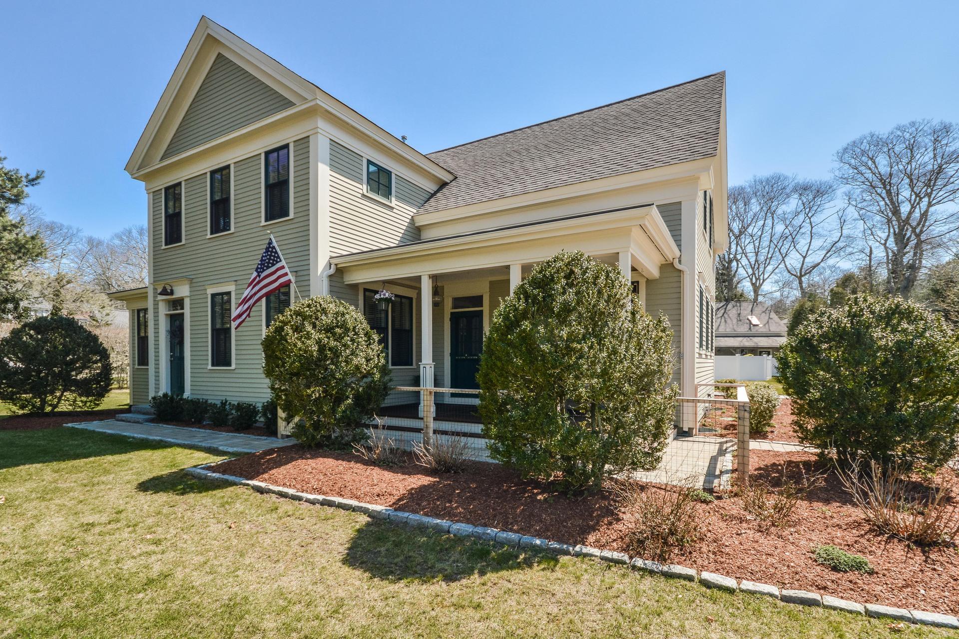 169 Tonset Road Orleans, MA 02653 - Photo 29 of 35 a front view of a house with garden