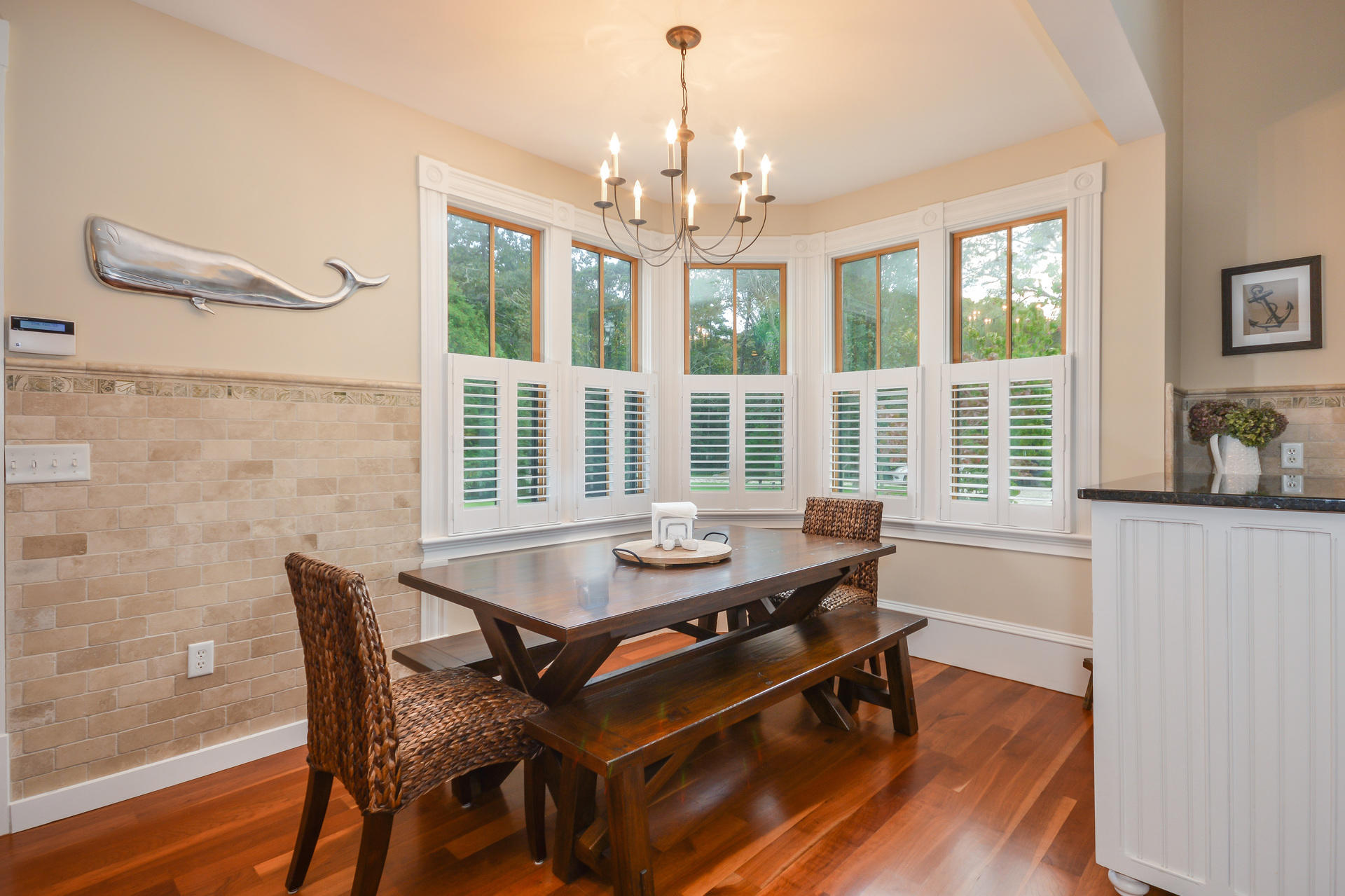 169 Tonset Road Orleans, MA 02653 - Photo 7 of 35 a dining room with furniture window and wooden floor