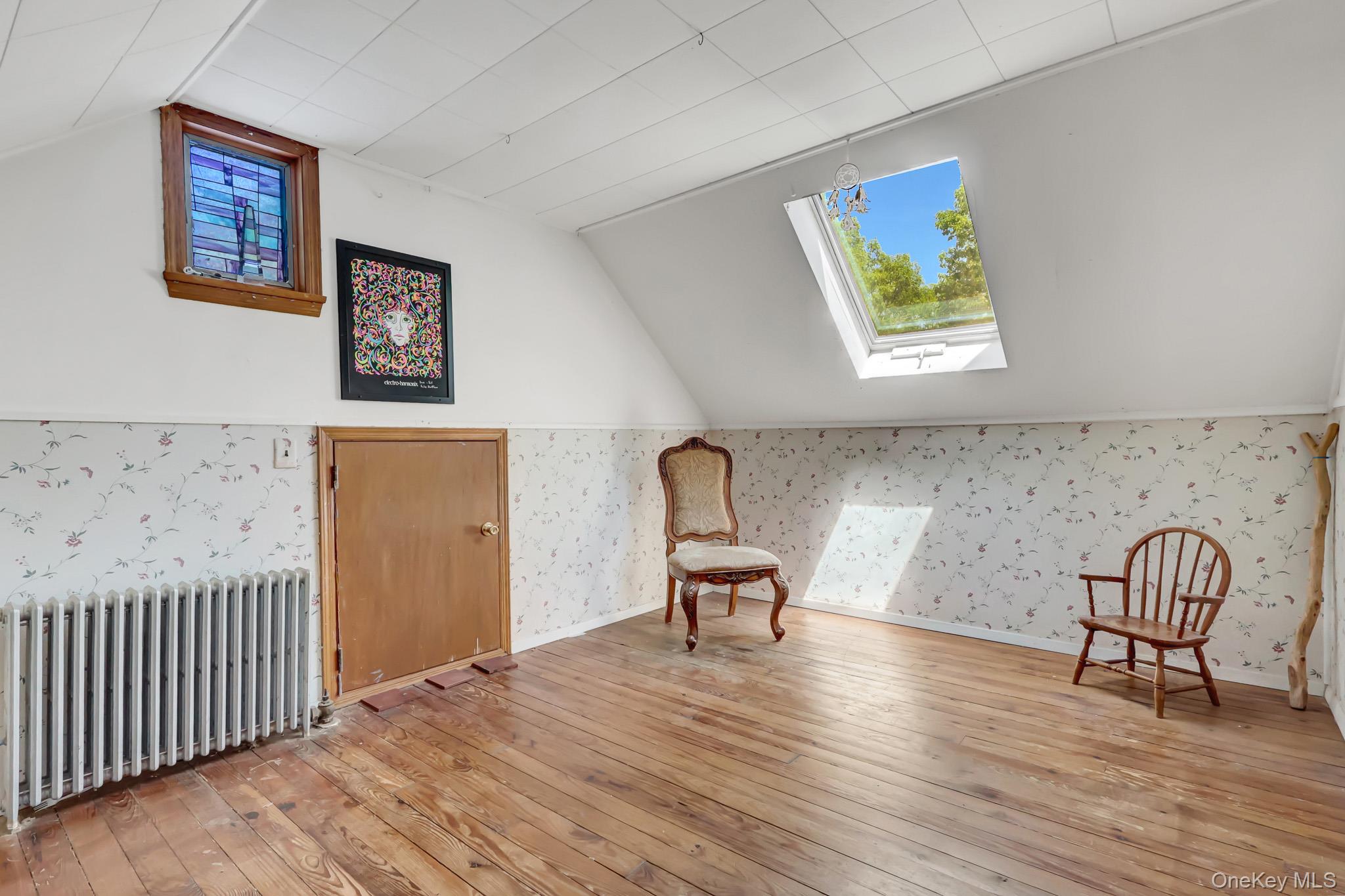 100 Elwood Road Northport, NY 11768 - Photo 22 of 39 Bedroom with hardwood floors