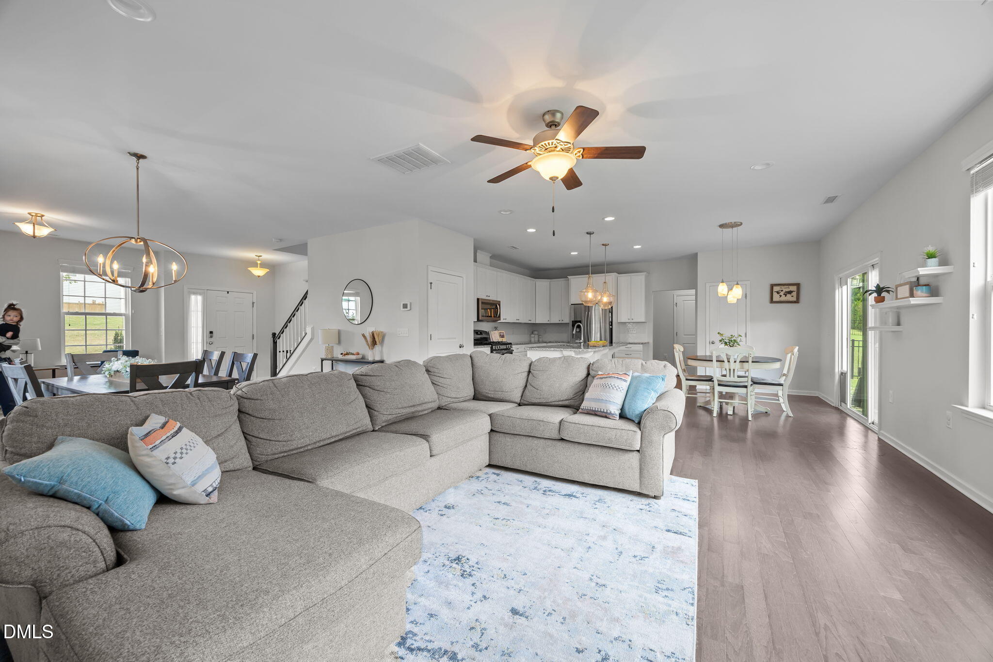1525 Reynolds Mill Road Wake Forest, NC 27587 - Photo 13 of 40 a living room with furniture and wooden floor
