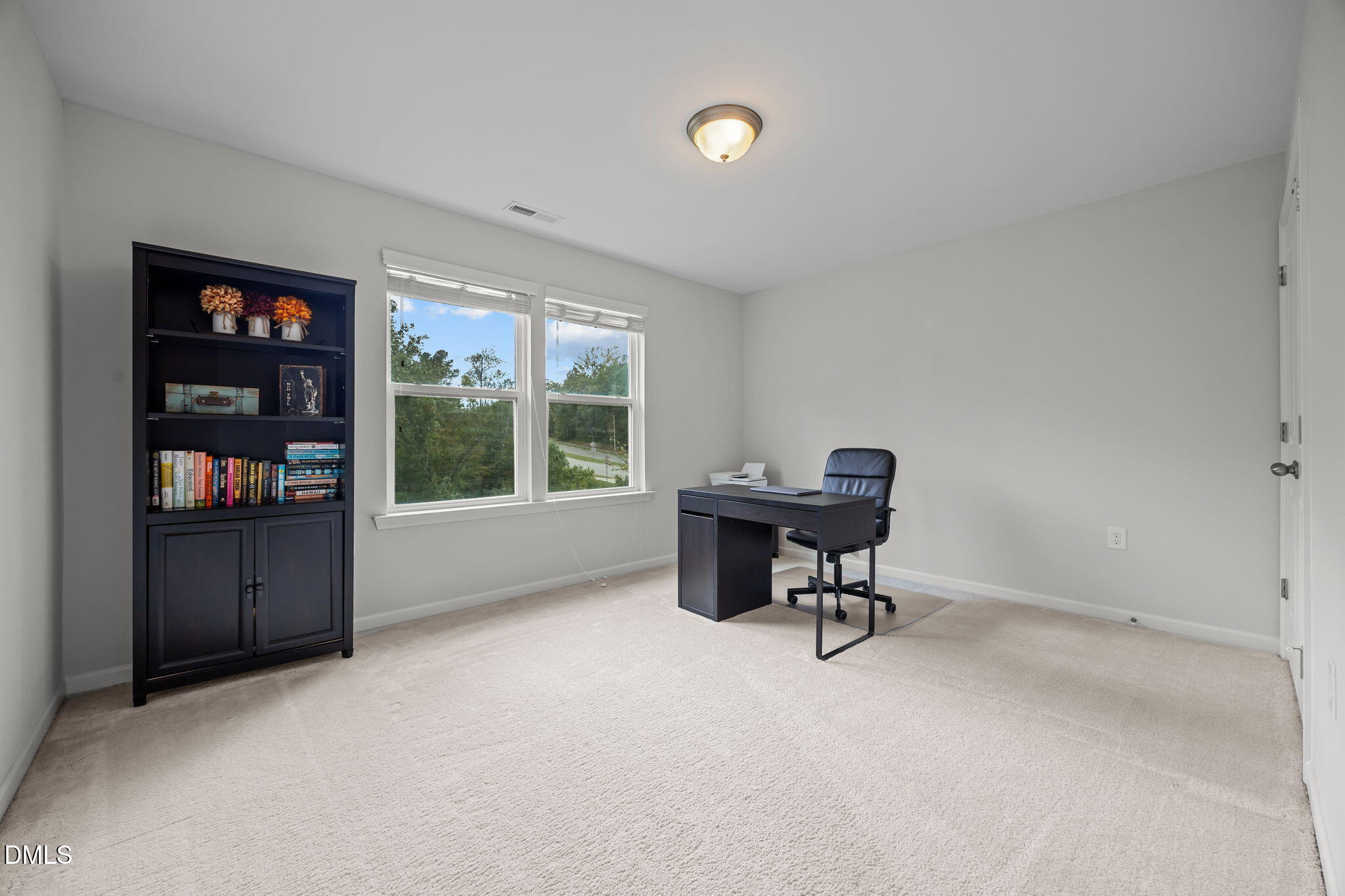 1525 Reynolds Mill Road Wake Forest, NC 27587 - Photo 22 of 40 a workspace with furniture and a window