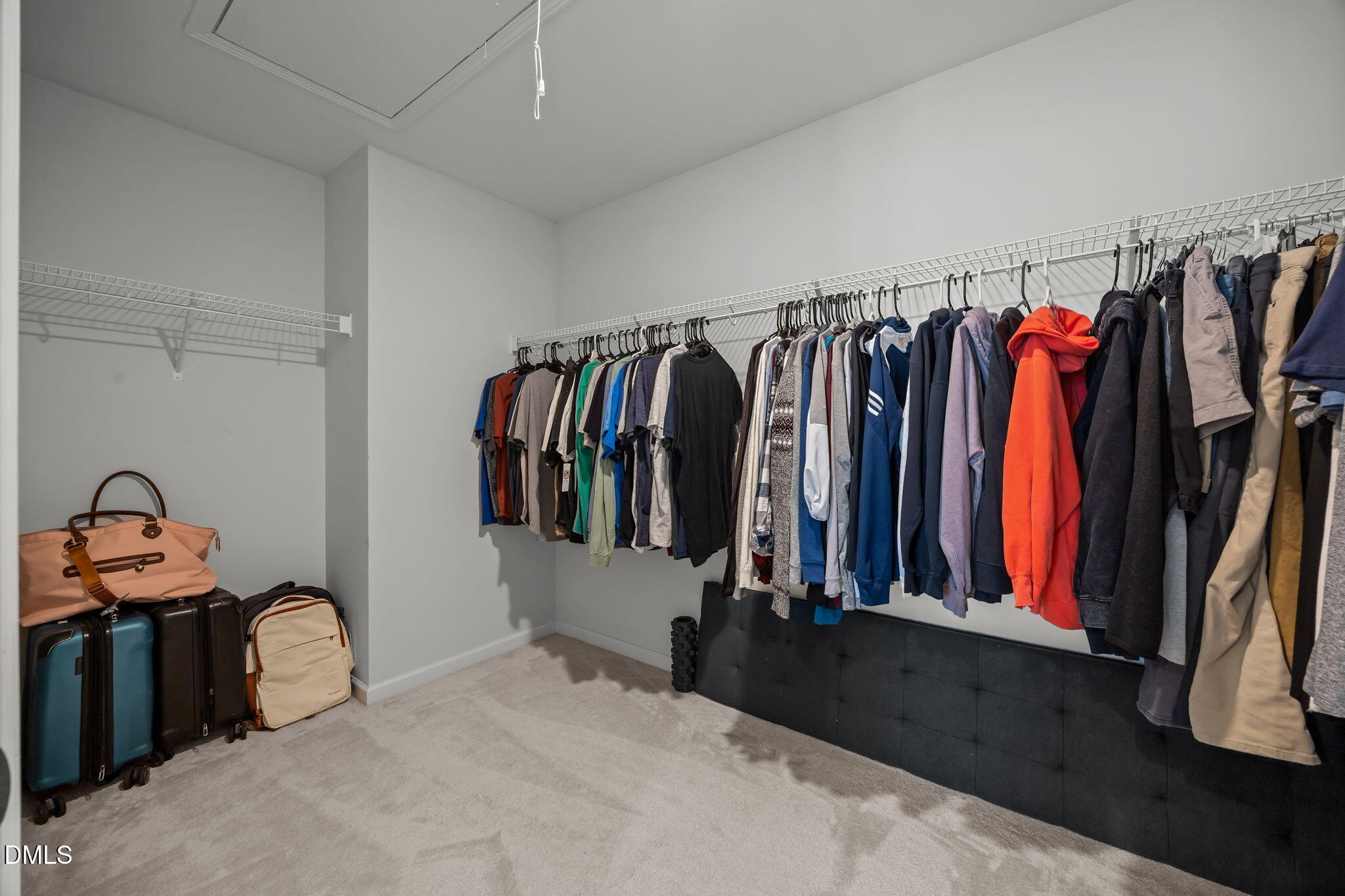1525 Reynolds Mill Road Wake Forest, NC 27587 - Photo 27 of 40 a view of walk in closet with clothes