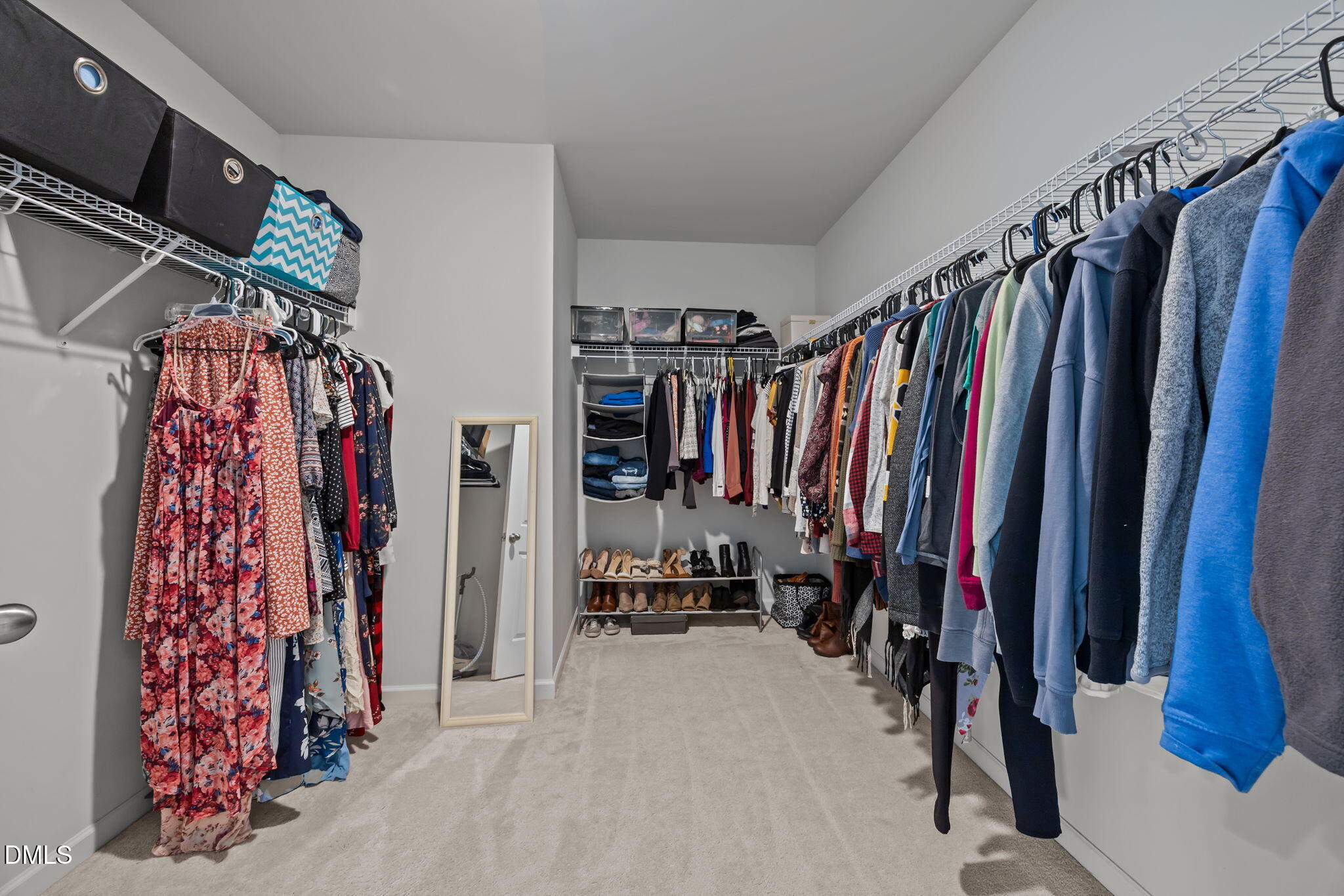 1525 Reynolds Mill Road Wake Forest, NC 27587 - Photo 28 of 40 a view of walk in closet with clothes