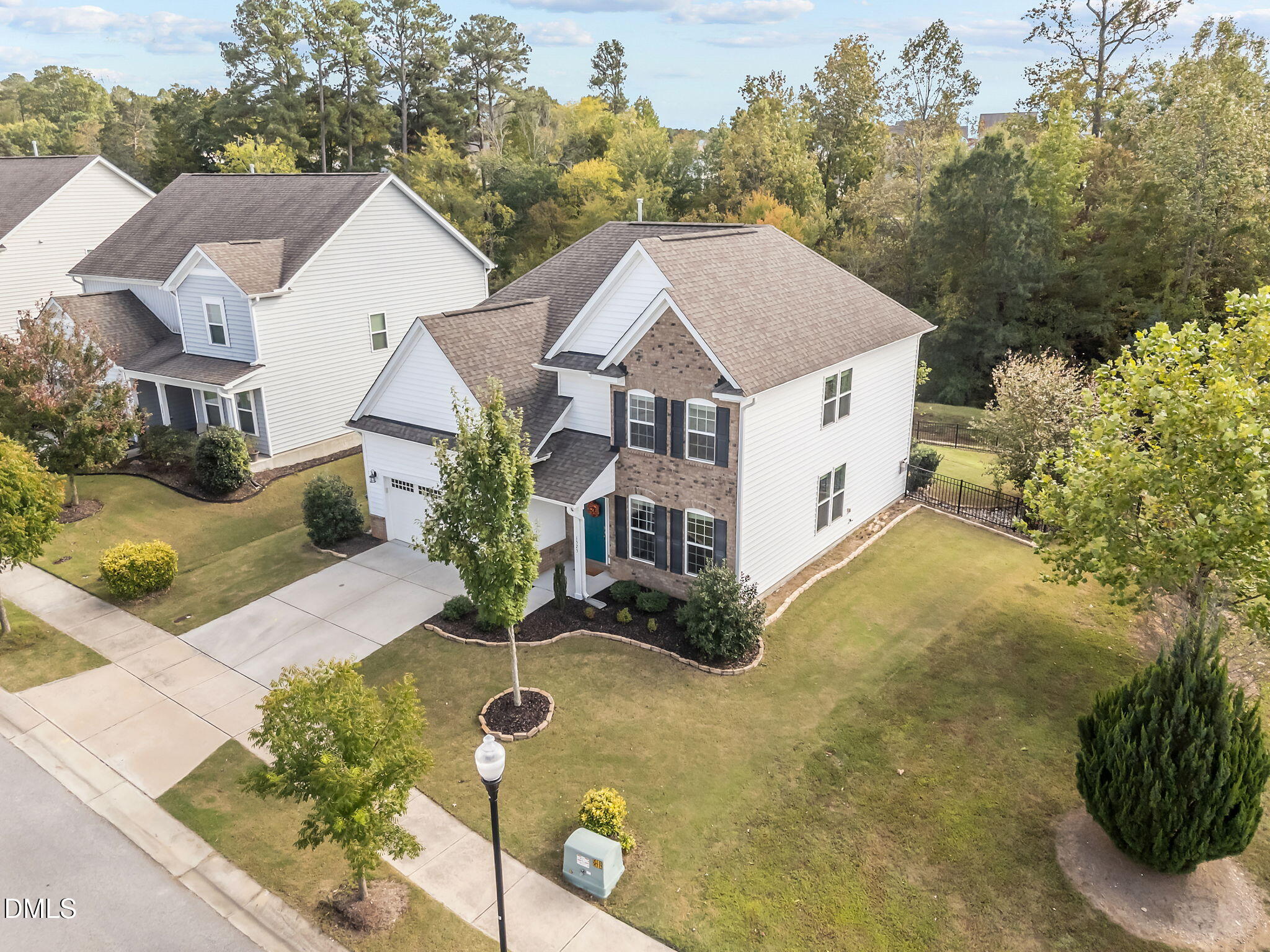 1525 Reynolds Mill Road Wake Forest, NC 27587 - Photo 5 of 40 a aerial view of a house with a yard