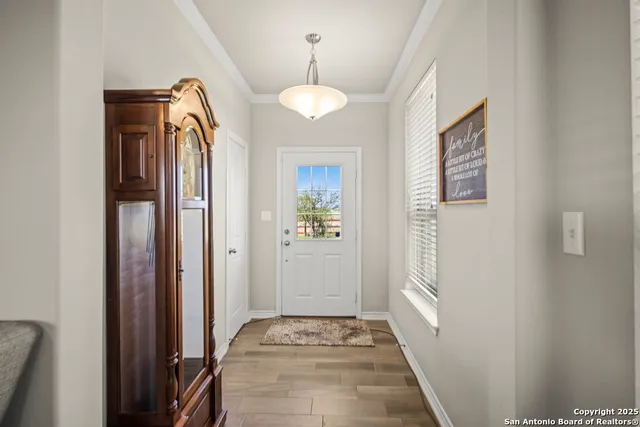 a kitchen with stainless steel appliances a refrigerator stove microwave and sink