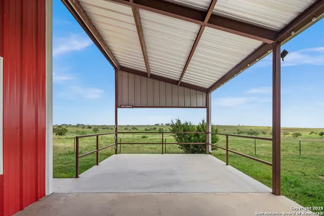 a view of porch with a backyard