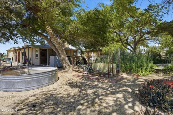 a view of house with outdoor space