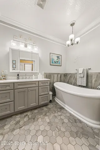 a view of a hallway with wooden walls and stairs